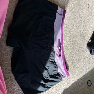 Black and purple speed up Lululemon shorts